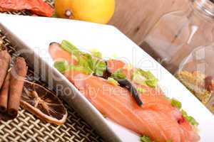 Slice of red fish salmon with fruits