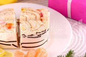 sweet cake on white plate and fruits