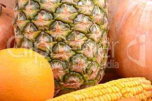fresh pineapple with corn and orange