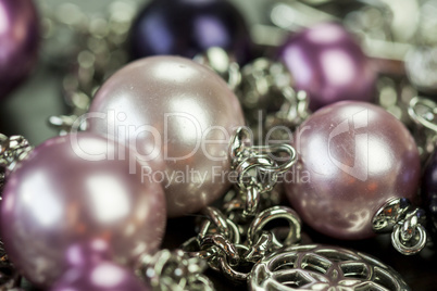 Attractive shiny purple beads on jewellery