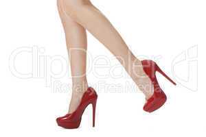 Woman Legs in Elegant Red Shoes