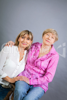 Senior lady with her middle-aged daughter