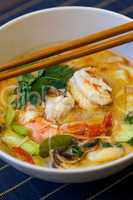 Bowl of traditional Thai tom yam soup