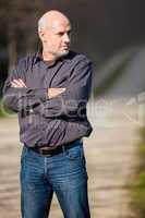 Confident attractive man standing waiting