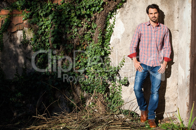 Male model sitting with legs crossed