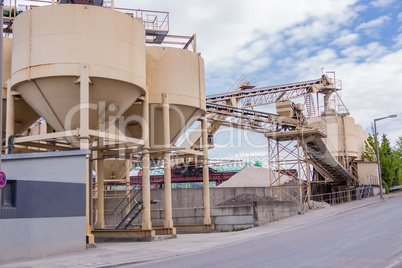 Metal tanks at a refinery plant or factory