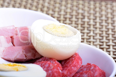 slices of salame from tuscany and egg