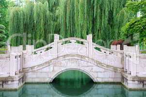 beautiful stone bridge in city park