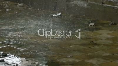 Abandoned factory ruins in raining day , leaking water