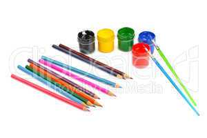 watercolor paint and colored pencils isolated on white backgroun
