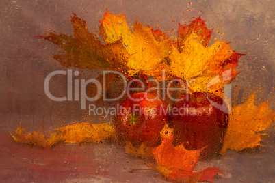 Autumn Still Life with Apples and autumn leaves