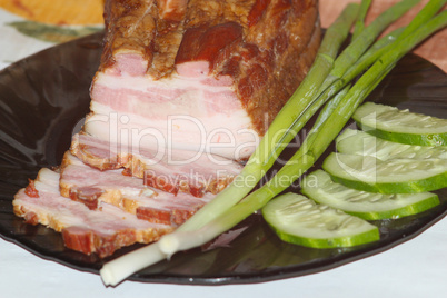 pieces of fresh cooked meat with spring onions