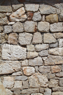 The wall of natural stone