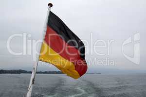 Flag of the Federal Republic of Germany on a flag pole