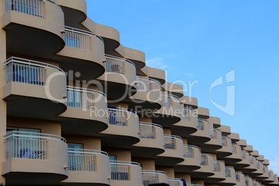 Windows and balconies. Modern house with many windows and balconies.