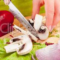 cutting mushroom champignon