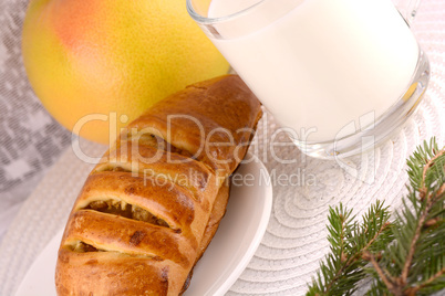 sweet cake on white plate and fruits