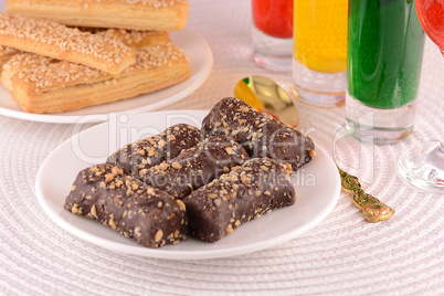 chocolate sweet cake on white plate and juice