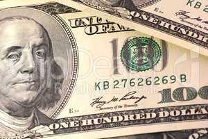 Dollars closeup. Benjamin Franklin portrait on one hundred dollar bill