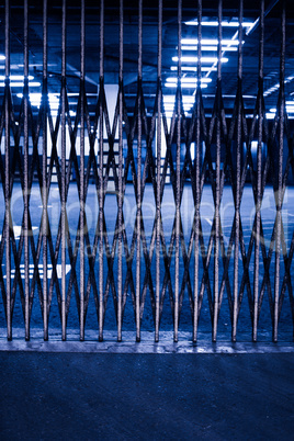 Security Fence in Parking Garage at Night