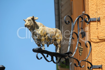 The figure of a bull on the facade of the house