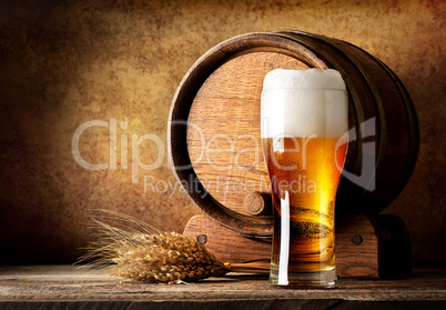 Wooden barrel and beer