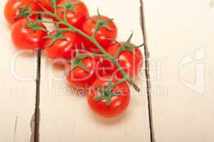 fresh cherry tomatoes on a cluster