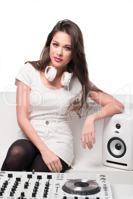 Sexy attractive DJ relaxing on a sofa
