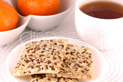 sweet cake and fruits, tea (coffee) cup and fruits