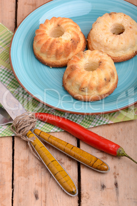 cheese cake on blue plate with red pepper