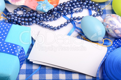 Colorful Easter Eggs with ribbon on the white background
