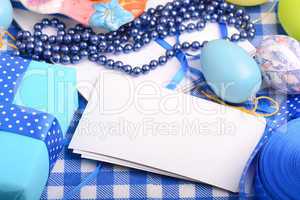 Colorful Easter Eggs with ribbon on the white background