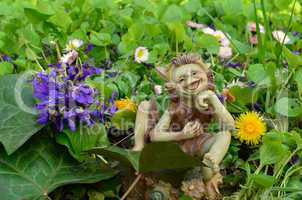 Bouket of Violets and dwarf doll