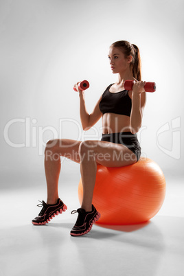 Sporty woman doing aerobic exercise