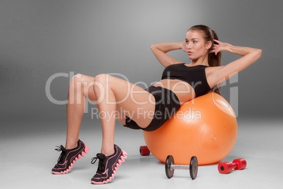Sporty woman doing aerobic exercise
