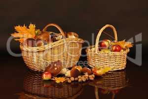 Two baskets - with apples and mushrooms
