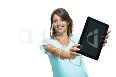 Pretty Woman Browsing at her Tablet Computer