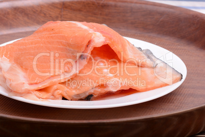 Fresh uncooked red fish fillet slices