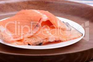 Fresh uncooked red fish fillet slices