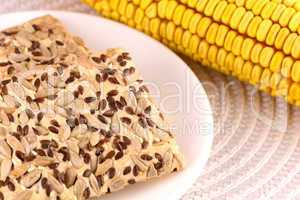 sweet cake on white plate and corn