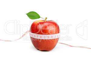 red apple and measure tape