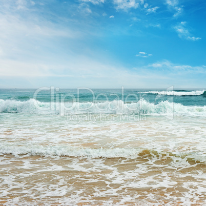 Ocean waves and blue sky