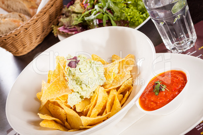 Crisp corn nachos with guacamole sauce