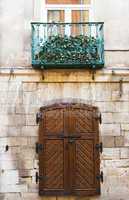 Old rustic wooden gate .