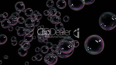 A Lot of Beautiful Soap Bubbles flying on black background. HD 1080.