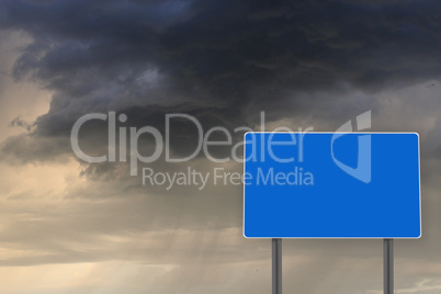 empty billboard for inscription on the background of dark clouds