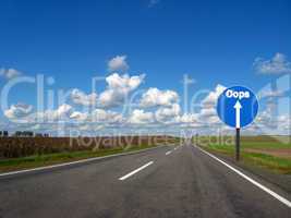 asphalted road and the blue sky