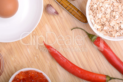 bowl of corn flakes and red pepper