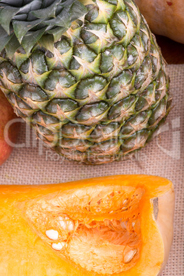 fresh pineapple with corn and orange