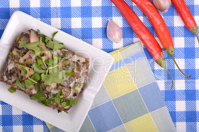 mushroom salad and red pepper on white plate